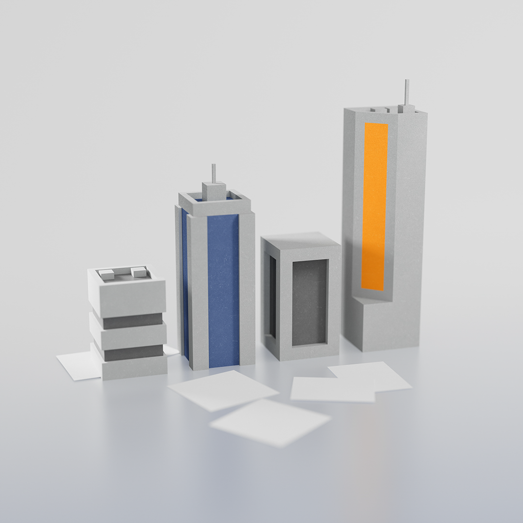 Verschiedene stilisierte Gebäudemodelle in grauen und blauen Farbtönen sowie ein orangefarbenes Element stehen auf einer glatten Oberfläche.